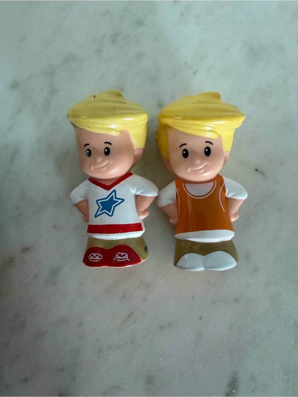 Fisher-Price Little People Eddie figures blonde hair sports-themed outfits